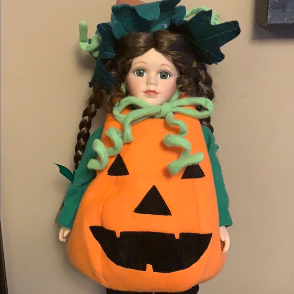 Porcelain Doll with pumpkin costume